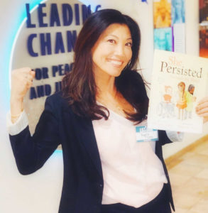 LEAGUE GATHERING: League Member Angela Chee with her signed Chelsea Clinton Book | JUSTLIKEMYCHILD.ORG